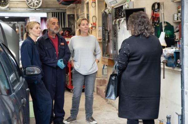 A client speaks to Abi, Kevin and Cassie at the garage in Corrie