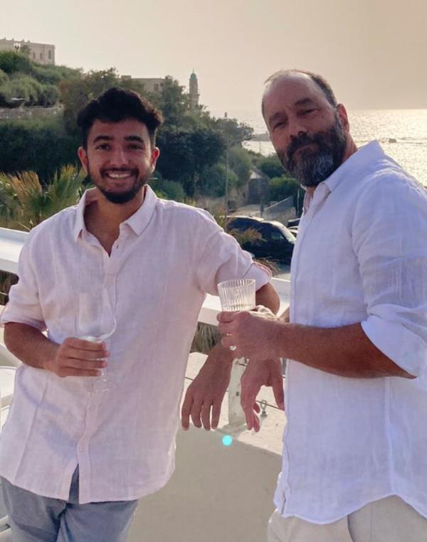 Hersh Goldberg-Polin (left) with his father, Jon Polin.
