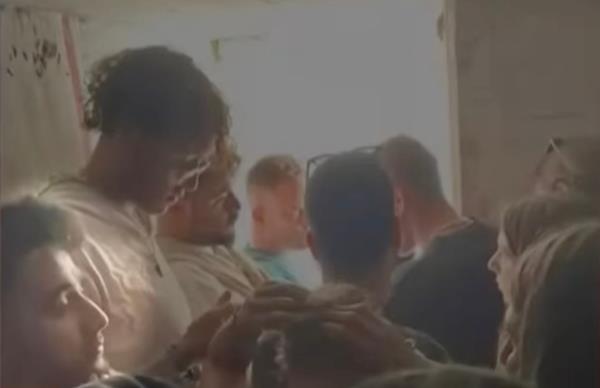 Hersh (bottom left) initially hid in a bomb shelter with a<em></em>bout 29 other people, his parents said.