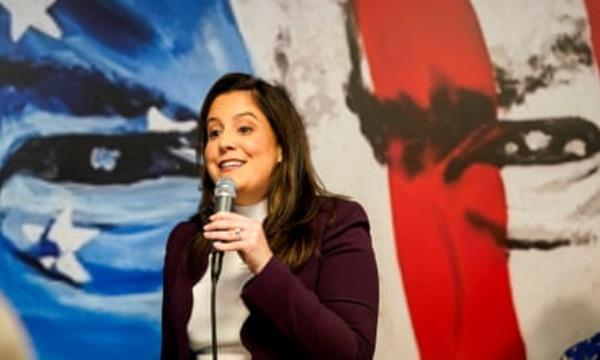 woman speaking into a microphone
