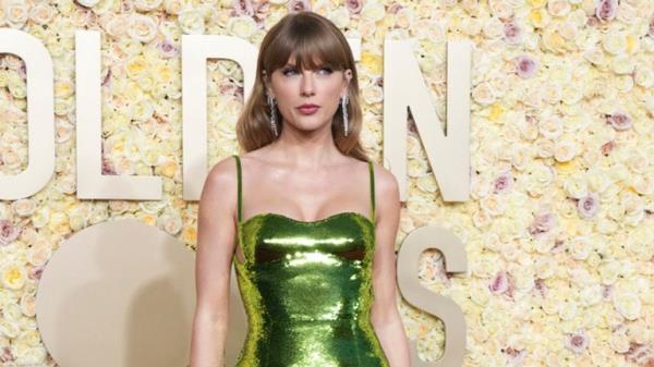 Taylor Swift arrives at the 81st Golden Globe Awards on Sunday, Jan. 7, 2024, at the Beverly Hilton in Beverly Hills, Calif. (Photo by Jordan Strauss/Invision/AP)