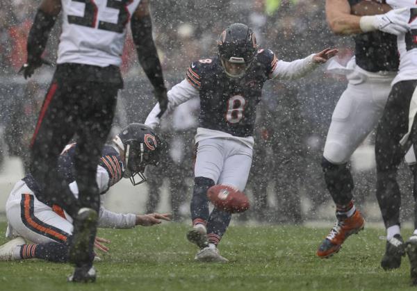 Bears quarterback Justin Fields rushes for a touchdown against the Falcons in the second quarter on Dec. 31, 2023, at Soldier Field.