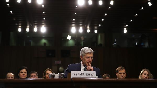 Neil Gorsuch looks down during co<em></em>nfirmation hearing