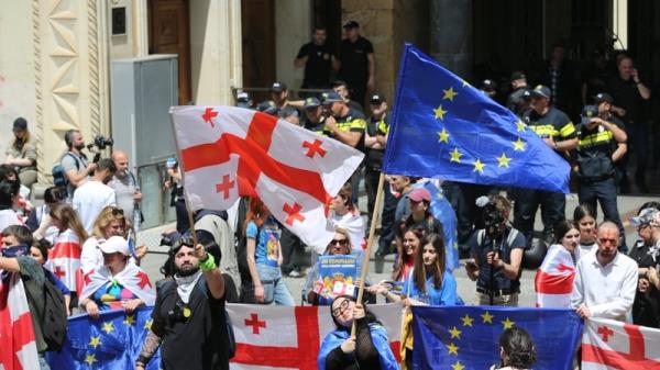 The passage of the law has prom<em></em>pted mass protests outside parliament