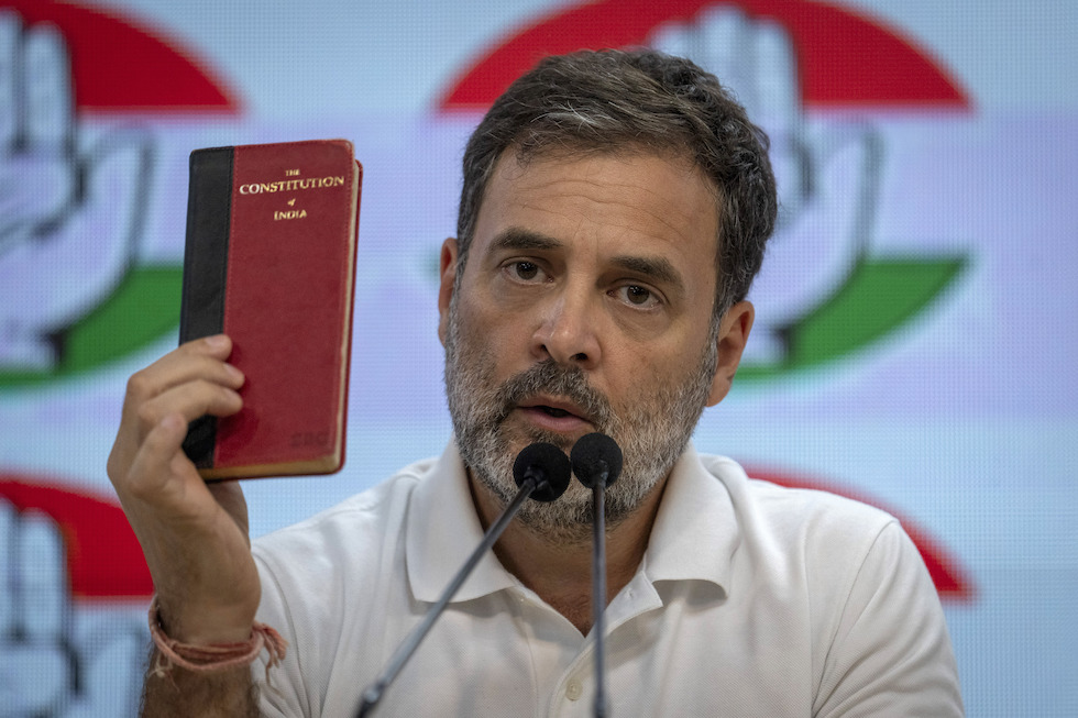 Rahul Gandhi with a copy of the Indian Co<em></em>nstitution 