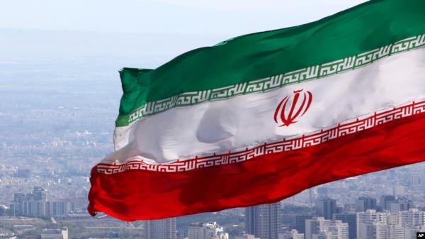 FILE - Iran's natio<em></em>nal flag waves in Tehran, Iran, March 31, 2020.