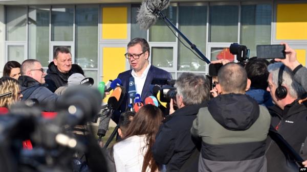 FILE - Serbian President Aleksandar Vucic speaks to reporters in Belgrade, April 3, 2022. Serbia has a vibrant media landscape, but reporters often face political pressure, according to press freedom groups.