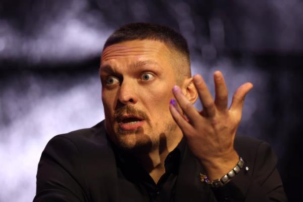 LONDON, ENGLAND - NOVEMBER 16: Oleksandr Usyk reacts during the Tyson Fury v Oleksandr Usyk Press Co<em></em>nference at Outernet Lo<em></em>ndon on November 16, 2023 in London, England. (Photo by Alex Pantling/Getty Images)
