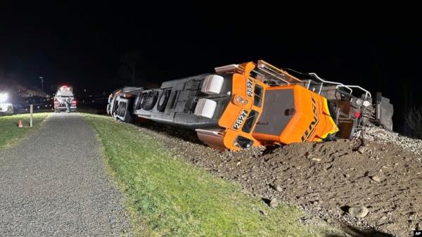FILE - A derailed BNSF train is pictured on the Swinomish reservation near Anacortes, Wash., March 16, 2023. A judge on June 17, 2024, ordered BNSF Railway to pay nearly $400 million to the tribe for trespassing. (Washington Department of Ecology/AP)