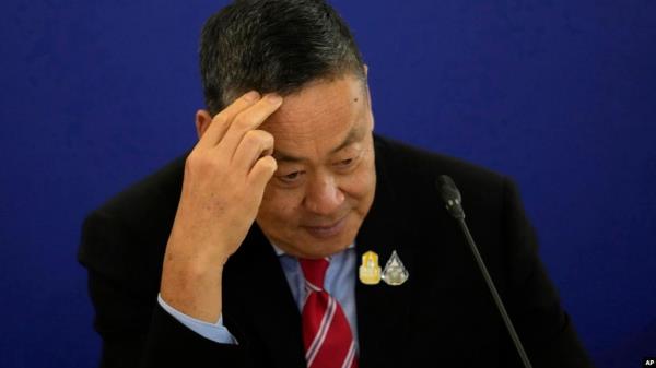 FILE - Thailand's Prime Minister Srettha Thavisin gestures as he talks to media during a news co<em></em>nference at the government house in Bangkok, Thailand, April 10, 2024. 