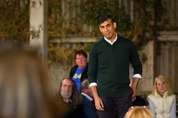 Britain's Prime Minister and Co<em></em>nservative Party leader, Rishi Sunak holds a Q&A event with farmers in Barnstaple, south west England, on June 18, 2024, as part of a Co<em></em>nservative campaign event in the build-up to the UK general election on July 4. (Photo by Leon Neal / POOL / AFP) (Photo by LEON NEAL/POOL/AFP via Getty Images)