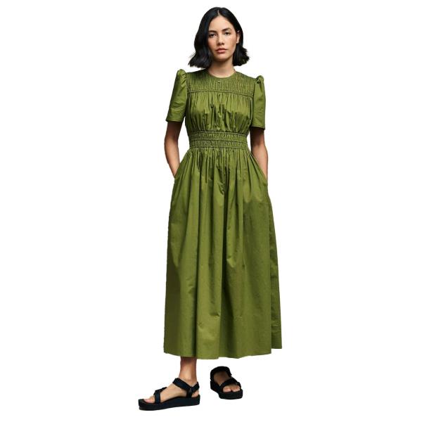 Image may contain: Clothing, Dress, Adult, Person, Evening Dress, Formal Wear, Footwear, Sandal, Fashion, and Accessories