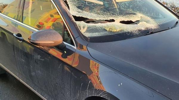 Mr Dennis' car after it was struck by the scaffolding board 