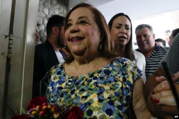 Substitute opposition presidential candidate Corina Yoris exits a press co<em></em>nference accompanied by opposition leader opposition leader Maria Corina Machado, in Caracas, Venezuela, March 22, 2024.