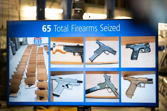 A photo of firearms seized is displayed during a news co<em></em>nference regarding an investigation into the theft of gold from Toronto’s Pearson Internatio<em></em>nal Airport, in Brampton, Ontario, Canada 
