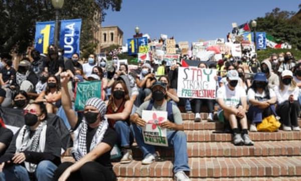 People gather in support of the encampment of pro-Palestinian protesters on the campus of University of California Los Angeles (UCLA) on Wednesday.