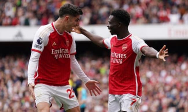 Bukayo Saka (right) celebrates with Kai Havertz after co<em></em>nverting Arsenal’s first-half penalty.