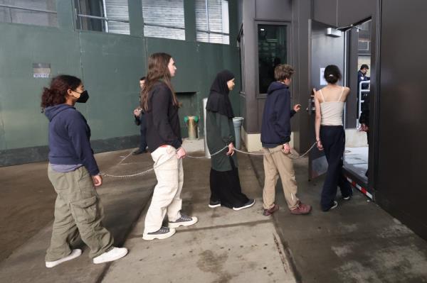 Protesters were walked through the corrections department at 100 Centre Street.