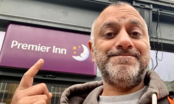 Rich Pelley outside a Premier Inn