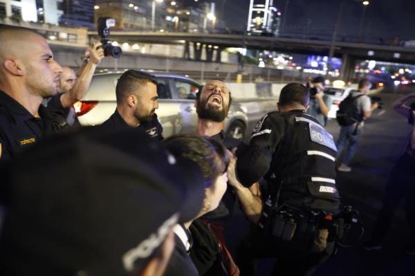  Police act as families and supporters of hostages held by Hamas