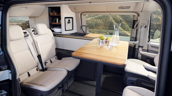 VW California Co<em></em>ncept - lounge area with table and sink