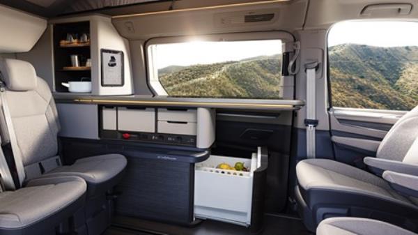 VW California Co<em></em>ncept - interior showing fridge and slide-out hob
