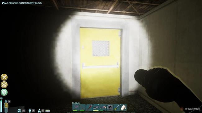 A screenshot from Abiotic Factor showing the player character aiming a flashlight at the yellow door on the roof of a building in Flathill.