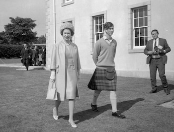 Elizabeth II with the Prince of Wales at Gordo<em></em>nstoun School in 1967