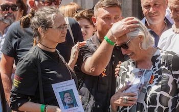 Cressida Haughton and other relatives of victims outside Central Hall in Westminster, London