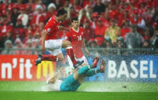 To Switzerland, co-hosts of Euro 2008, wher<em></em>e Hakan Yakin is – and you’ll have to take our word for it – tackled by Hamit Altintop