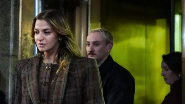 Grace Jabbari, second from left, the accuser in the assault case against Jo<em></em>nathan Majors, leaves court after giving testimony, Tuesday, Dec. 5, 2023, in New York. (AP Photo/Bebeto Matthews)