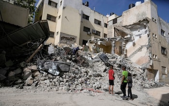 Bombed buildings and some children