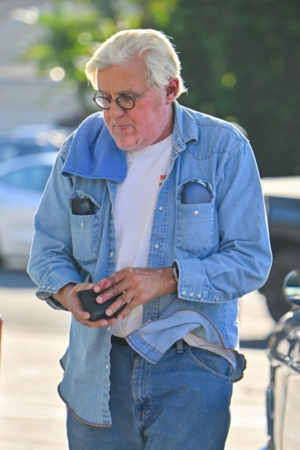 Jay Leno is seen stopping by a gas station after being released from a hospital