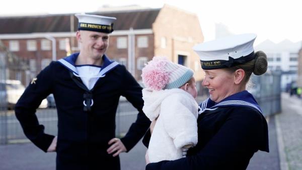 AB Lucy Phillips (right) and her fiance AB Luke Gorst meet family after the Royal Navy aircraft carrier HMS Prince of Wales returns to Portsmouth Naval ba<em></em>se following it's three-mo<em></em>nth deployment to the Eastern Seaboard of the United States, wher<em></em>e the Prince of Wales has been undergoing trials and operating with aircraft and drones. Picture date: Mo<em></em>nday December 11, 2023. PA Photo. See PA story DEFENCE Carrier. Photo credit should read: Andrew Matthews/PA Wire