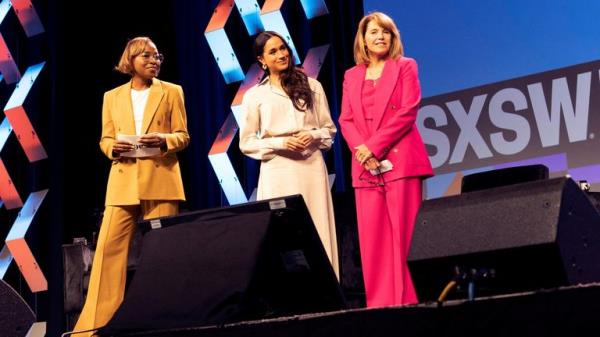 Meghan, Duchess of Sussex, waits for other panellists to take the stage during a keynote speech on women's representation in media and entertainment in Austin, Texas, on Internatio<em></em>nal Women's Day 2024. Also pictured are Errin Haines, left, and Katie Couric, right. Pic: Reuters