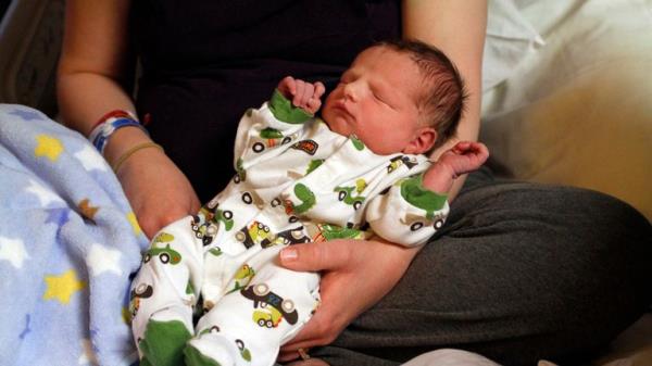 Sherri Rogers holds her son Nathanial Levi who was born on leap day, Wednesday, Feb. 29, 2012 at the Hutchinson Regio<em></em>nal Medical Center in Hutchinson, Kan.. Nathanial was born 7lbs. 3oz. and 20 inches long. This is the third son for Sherri and her husband, Michael. (AP Photo/The Hutchinson News, Colleen Lefholz)