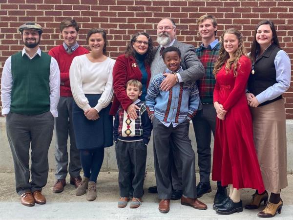 Mark Robinette and his family – including his eight children – pose together in happier times.