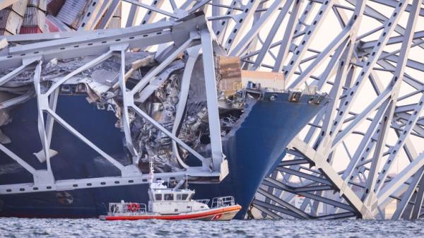 Pic: Jim Lo Scalzo/EPA-EFE/Shutterstock</p>

<p>　　The Francis Scott Key Bridge rests partially collapsed after a cargo ship ran into it in Baltimore, Maryland, USA, 26 March 2024. 