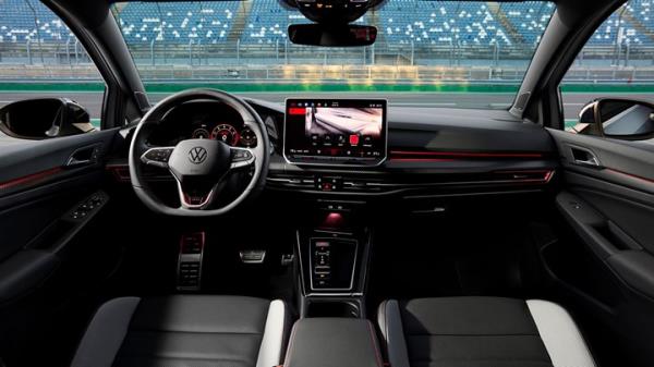 Volkswagen Golf GTI Clubsport facelift: dashboard and infotainment system, from rear seat, black upholstery