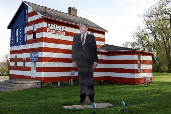A cutout of Republican presidential candidate and former U.S. President Do<em></em>nald Trump stands in front of a Trump-themed building as Republicans and Democrats vote in Pennsylvania primary elections in Latrobe, Pennsylvania, U.S. April 23, 2024.