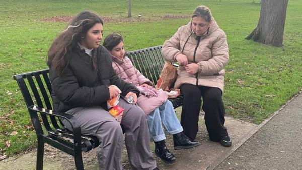 Nedret Batir and her daughters Ebru (L) and Eda now face a two to three-hour bus journey to school