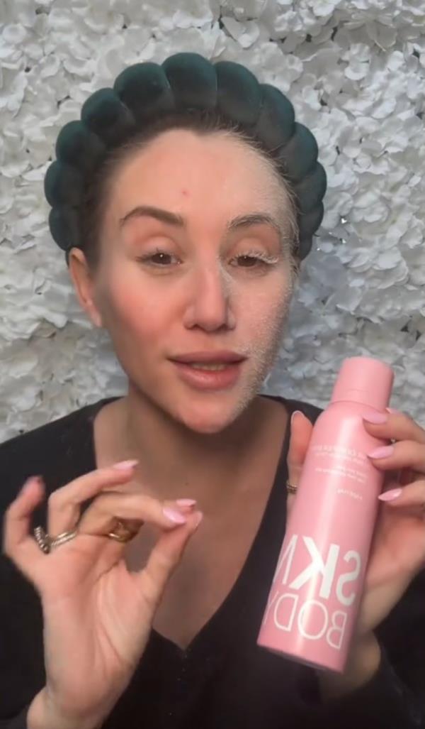 Alexis Christine using the SNKBODY hair identifier spray. 
