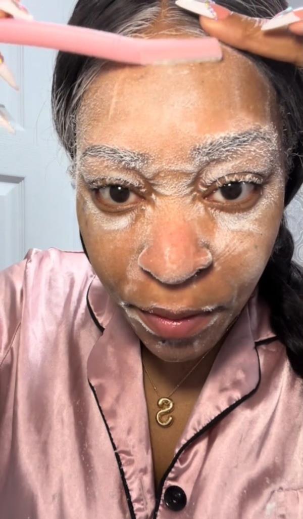 Shekia Ceaser using the SNKBODY hair identifier spray. 