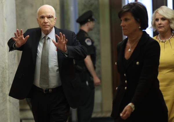 McCain waving to camera