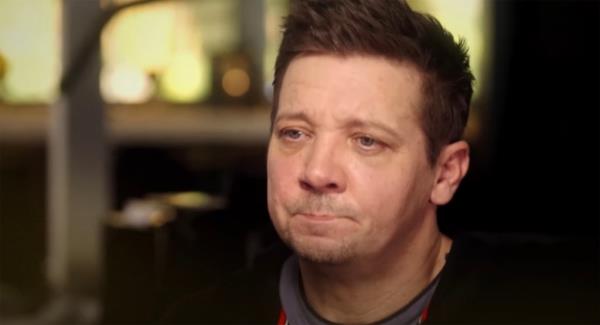 Jeremy Renner holding back tears. 