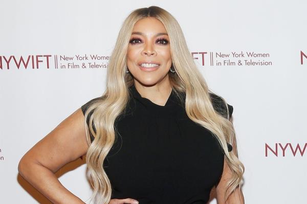 Wendy Williams wears a black dress