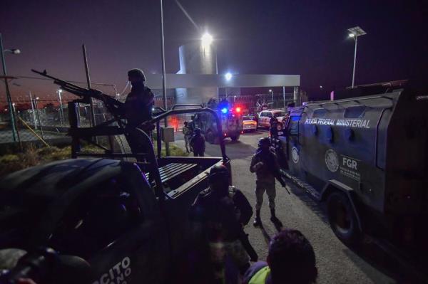 Members of the Mexican Army were seen arriving at the Federal Center for Social Readaptation Guzman was admitted by helicopter.