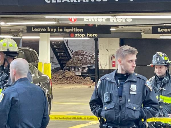 Robot dog inspect scene of parking garage collapse. 