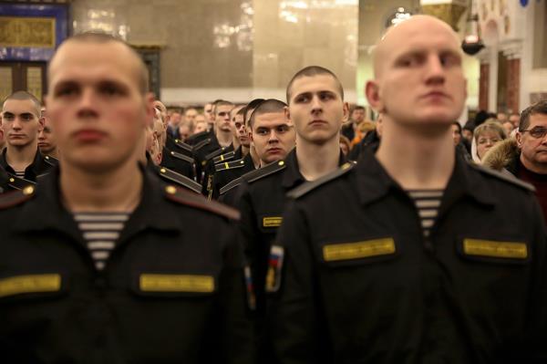 Russian troops attend the Orthodox Christmas service at the Russian Armed Forces' main cathedral in the Patriot military park in Kubinka.