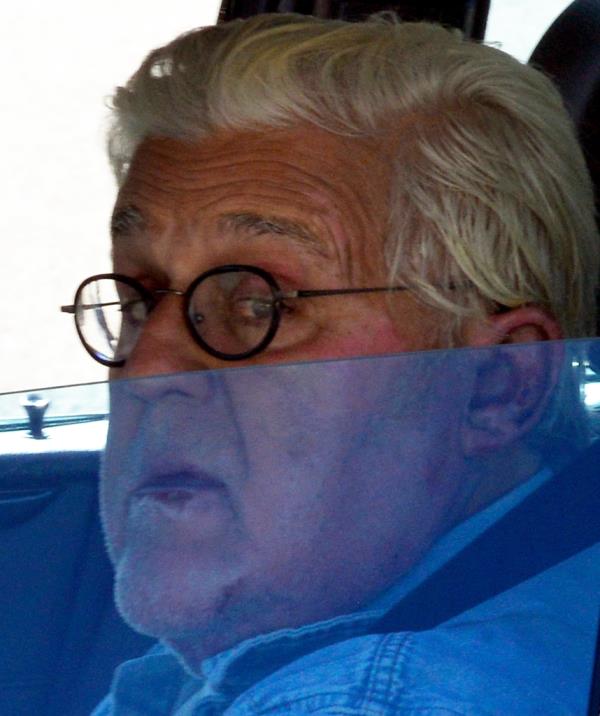 Leno driving his 1963 Corvette after returning to his garage.